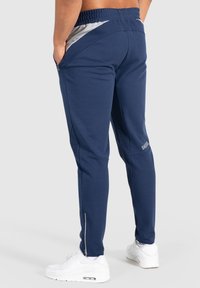 Smilodox MAISON - Verryttelyhousut - dunkelblau