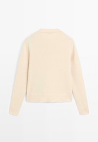 Light beige sweater with a round neckline, ribbed hem and cuffs, made from a soft, textured knit fabric. Simple and minimalistic design.