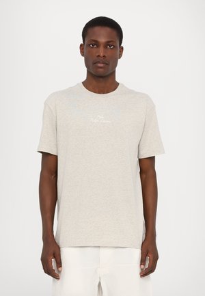 Light gray t-shirt made of soft cotton, featuring a crew neck and short sleeves. It has a small white embroidered logo on the chest.