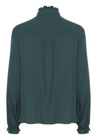 Dark green blouse with long sleeves, ruffled collar, and back pleat detail. Smooth fabric with gathered cuffs and hem.