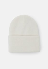 Cream-colored knit beanie with a rolled cuff. Made of soft, elastic material with a smooth texture and subtle stitching details.