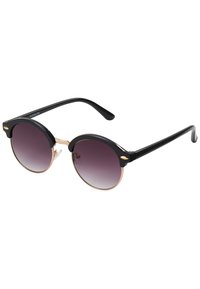 Gafas de sol redondas con montura de plástico negro y lentes en degradado púrpura oscuro. Accentos metálicos dorados en la montura. Brazos delgados en negro.