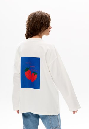 - Bluzka z długim rękawem