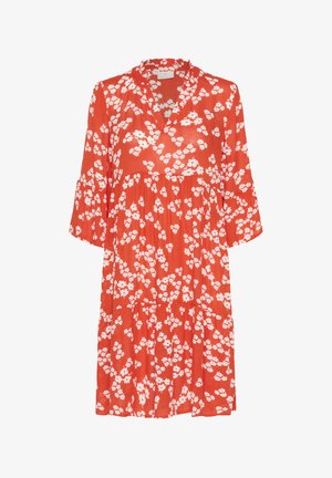 Red floral dress with three-quarter sleeves, v-neckline, and tiered skirt; features white flower patterns on lightweight fabric.