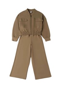 Khaki jumpsuit met lange mouwen, ritssluiting aan de voorkant, elastische tailleband, twee voorkorrekeningen en studs op de zakken en zijkanten.