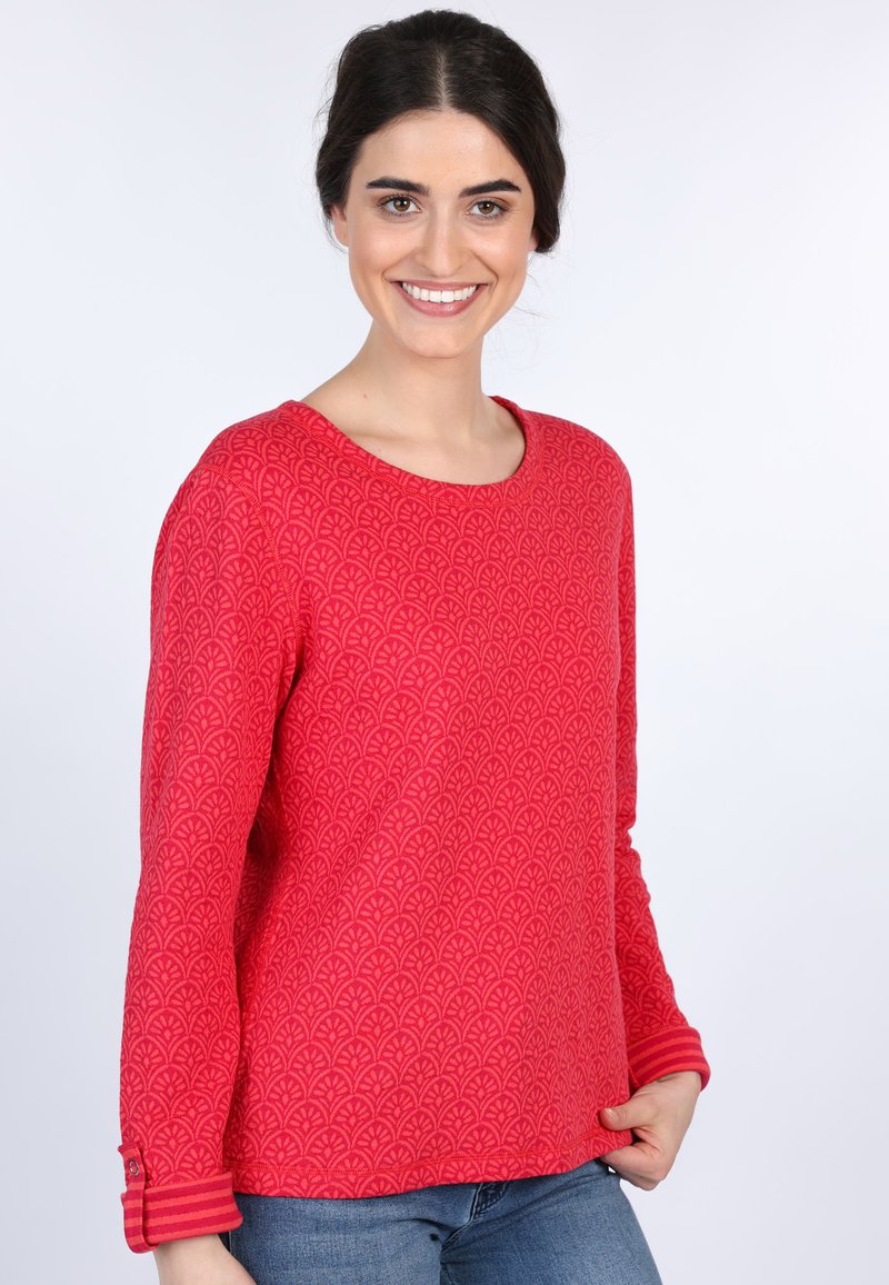 Rot gemusterter langärmeliger Pullover mit Rundhalsausschnitt und gestreiften Bündchen. Aus weichem Stoff gefertigt und mit einem floralen Design versehen.