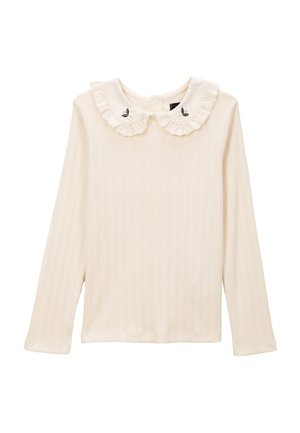 T-shirt à manches longues en matière côtelée crème, avec un col bordé de dentelle et des papillons brodés. Coupe classique avec un ourlet droit.
