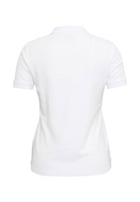 Vue de dos d'un polo blanc uni à manches courtes avec un col et une taille ajustée porté par une personne.