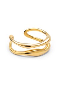 Pulsera de brazalete en metal tono dorado con un diseño ondulado y escultórico. Presenta superficies lisas y pulidas, y extremos abiertos para un ajuste ajustable.