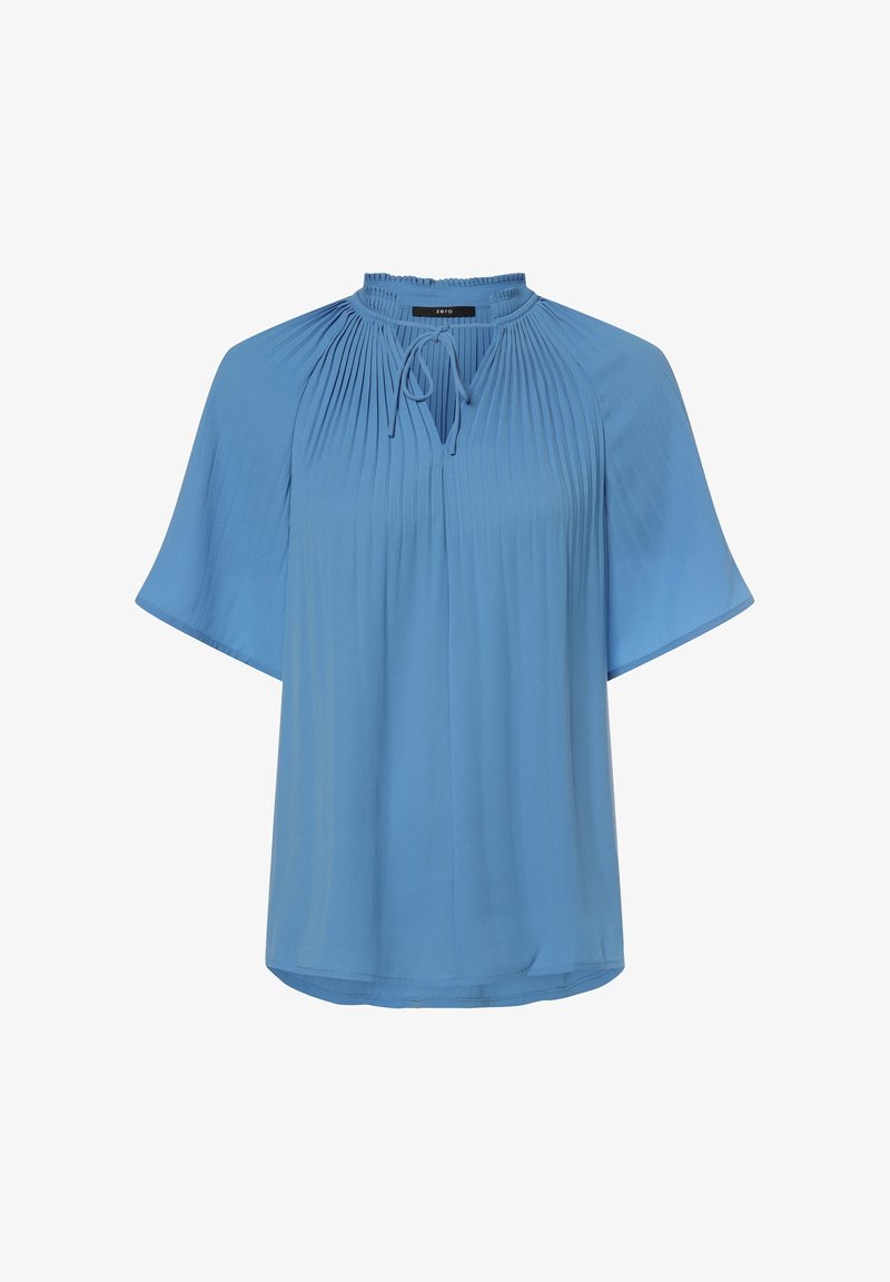 Blusa azzurro chiaro a maniche corte con fronte plissettato, scollatura rotonda e dettaglio con fiocco. Tessuto morbido con vestibilità rilassata e orlo arrotondato.