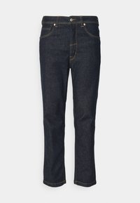 Tummansiniset suorat denimfarkut, joissa keltaiset saumat, viiden taskun muotoilu ja napillinen suljenta. Klassinen ja monikäyttöinen tyyli.