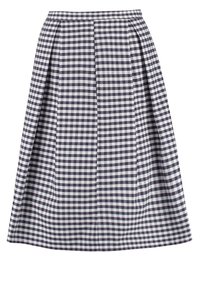 Gonna a scacchi con pieghe, caratterizzata da una combinazione di colori blu navy e bianco, realizzata in tessuto texturizzato, con una vita aderente.