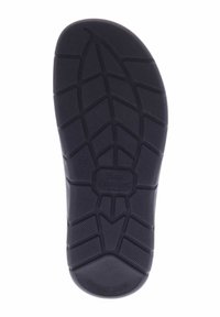 Zwarte rubberen zool met een gestructureerd oppervlak. Heeft een zigzagprofiel en het merk "Finn Comfort" dat nabij het midden is geperst.
