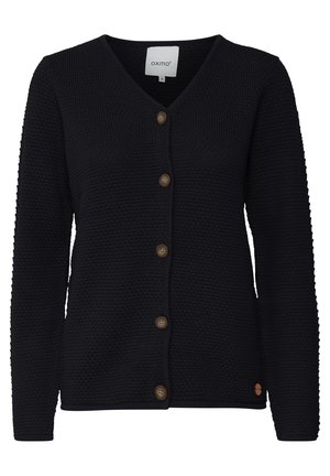 Cardigan en tricot bleu foncé avec un col en V, doté de cinq boutons marron, d'un tissu texturé, et d'un détail de logo en bas à droite.