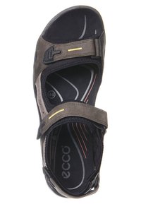 Sandal con punta sintetica marrone con accenti neri, cinturini regolabili e soletta imbottita. Presenta superfici testurizzate e una soletta curva. Taglia 44.
