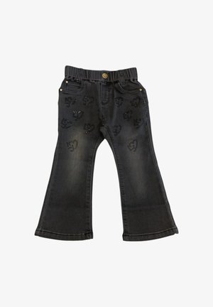 Pantaloni in denim neri svasati con una vita elasticizzata, caratterizzati da dettagli a forma di cuore in strass sparsi sul tessuto.