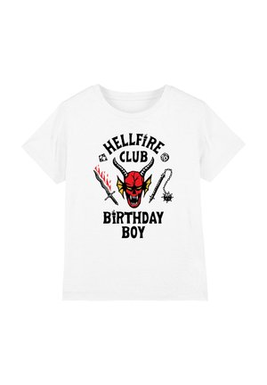 White cotton t-shirt featuring graphic print of a red demon face, black text "HELLFIRE CLUB BIRTHDAY BOY," and illustrated weapons.