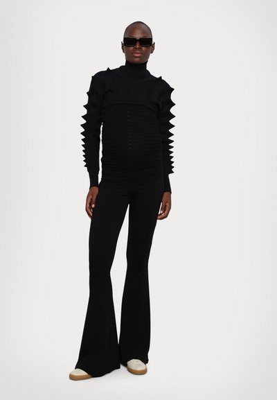 Stieglitz STIEG FLARED - Legging (type pantalon) - black