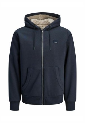 Granatowy bluza z kapturem, wykonana z miękkiego materiału, posiadająca zamek z przodu, dwie kieszenie na przedzie oraz puszystą podszewkę z polaru dla ciepła.