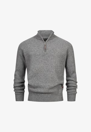 Grijze geribbelde gebreide pullovertrui met lange mouwen en een korte ritskraag, weergegeven tegen een witte achtergrond.