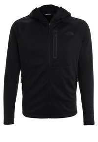 Zwarte hoodie met een volledige rits, gemaakt van zachte stof. Beschikt over een ritszak op de borst en twee zijzakken, geribde manchetten en een capuchon.