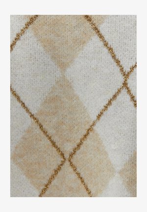 Beige ja valge kudum, millel on teemantimuster ja millel on kuldne tikand. Pehme tekstuur ja õrn sära metallkiu tõttu.