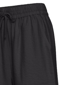 Pantalon léger en tissu noir avec taille élastique et cordon, comprenant des poches latérales et une coupe décontractée.