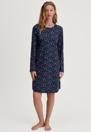 Camicia da notte lunga blu navy con motivo di lune e stelle bianche. Collo rotondo, orlo ondulato, tessuto morbido, design alla lunghezza del ginocchio.