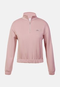 Sweat à col montant rose clair, avec une demi-fermeture éclair à l'avant et une poche poitrine zippée. Il présente un ourlet froncé et des manches longues ajustées.