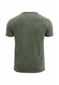 Olive green cotton t-shirt with a relaxed fit, short sleeves, and a rounded neckline. Subtle wash finish gives a textured appearance.