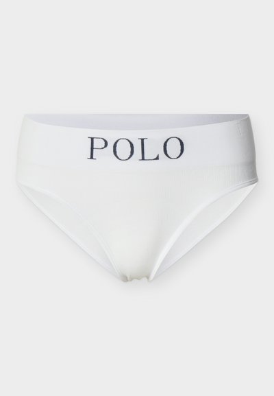 Culottes blanches sans couture avec une large ceinture arborant le logo noir "POLO" centré à l'avant.