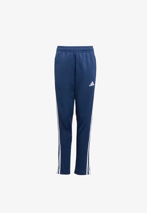 Navy blauwe sportbroek met een taps toelopende snit, witte zijkanten, elastische tailleband en een geborduurd wit logo. Zachte textielmateriaal.