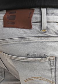 G-STAR 3301 STRAIGHT - Calças de ganga de perna direita - kamden grey stretch denim
