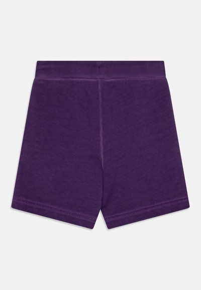 Purple cotton shorts with an elastic waistband, featuring a smooth texture and straight-cut legs. No pockets or additional accents.