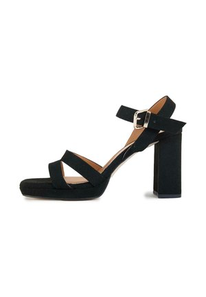Black suede women's sandal with block heel, open toe, double front straps, and adjustable ankle strap with silver buckle.