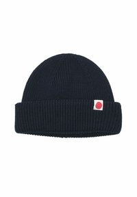 Navy knitted beanie with a ribbed texture and folded brim; features a small white tag with a red circle accent.