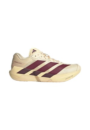 Zapatilla de correr Adidas color beige claro con rayas rojo oscuro, cordones y suela acolchada etiquetada con "Lightstrike Pro" y "Adizero Dropset."