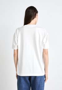 Calvin Klein Jeans MONOLOGO - T-shirt con stampa - bright white