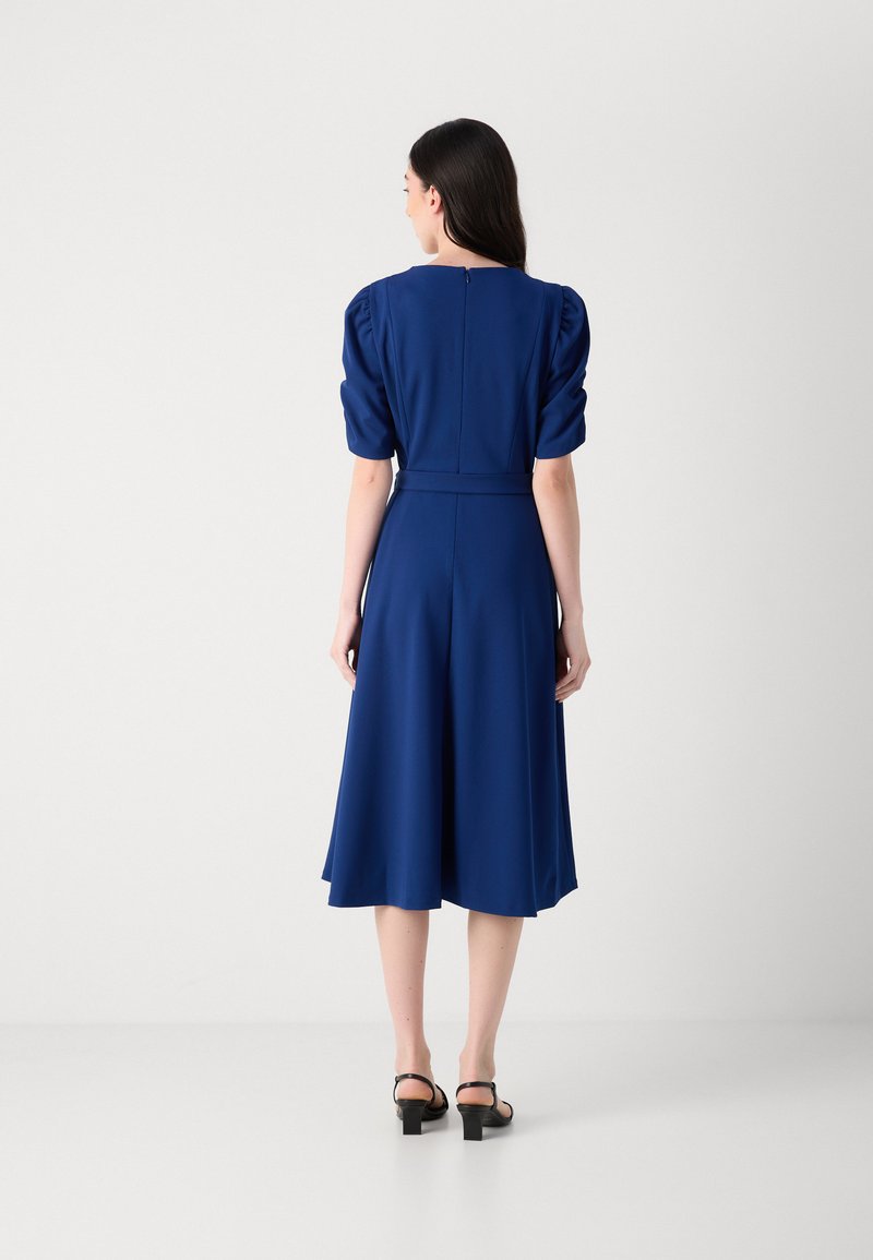 dkny ruched sleeve midi dress DKNY by Donna Karan Knit Round Neck Short Ruched Sleeve Tie Waist Midi Dress
