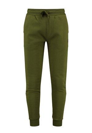 Pantalones de chándal verdes fabricados en una tela suave, con cintura de cordón, puños acanalados y un bolsillo lateral. Diseño simple, ajustado y con un mínimo de detalles.