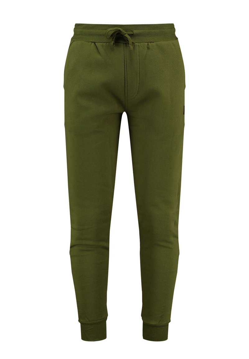 Zielone dresy wykonane z miękkiego materiału, z elastycznym paskiem w talii, ściągaczami u dołu i boczną kieszenią. Prosty, dopasowany krój z minimalnymi detalami.