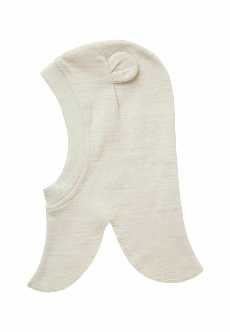 Světlobéžová kukla vyrobená z měkkého, pružného materiálu. Má zaoblenou vrchní část a vlnité okraje, s dekoračním knoflíkem na vrcholu.