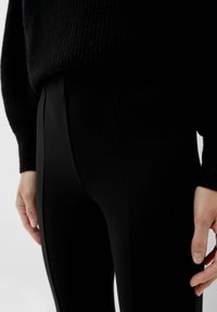 s.Oliver MIT FUSSSCHLAUFE - Legging - schwarz
