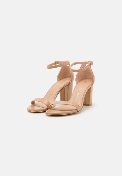Stuart Weitzman NEARLY - Sandaalit nilkkaremmillä - nude