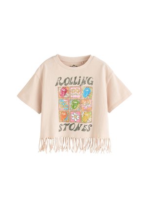 Cropped, beige T-shirt with fringed hem, featuring a colorful graphic of flowers and lips with "ROLLING STONES" text in dark print.