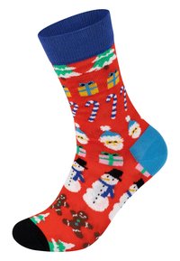 Chaussettes rouges ornées de motifs de bonhommes de neige, de cannes en sucre, de sapins de Noël et de cadeaux, avec un poignet bleu et un orteil noir. Matériau en coton.
