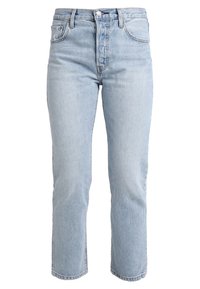 Světle modré džíny z denimu s vysokým pasem, rovného střihu, pěti kapsami a knoflíkovým zapínáním. Materiál je mírně strukturovaný.