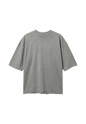 T-shirt en coton gris délavé à manches courtes surdimensionné avec bords bruts aux manches et à l'ourlet, col rond, présenté à plat sur fond blanc.