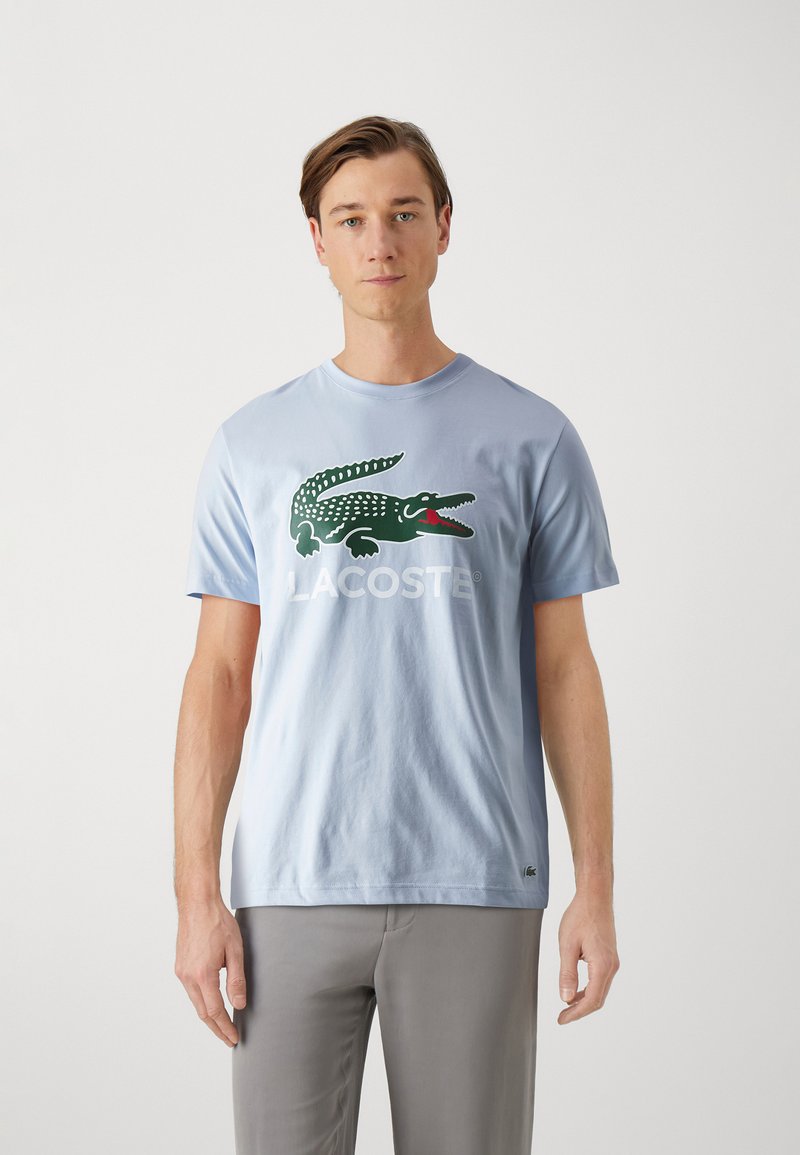 Lacoste Marškinėliai su spaudiniu - phoenix blue