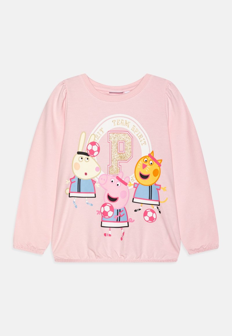 Chemise rose à manches longues en coton, ornée d'un motif avec des personnages de dessin animé jouant au football, soulignée par un design de lettres pailletées.